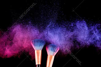 Cosmetics brush and explosion colorful makeup powder