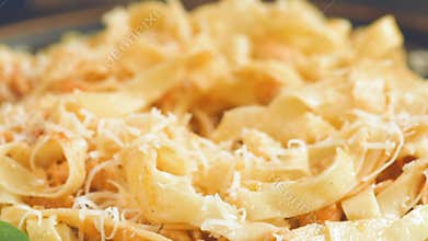 Eating plate of traditional Italian pasta .