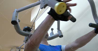 Man exercising on chest press machine
