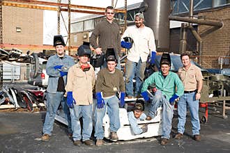 Factory Workers and Supervisor