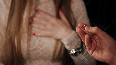 Guy wears a diamond ring girl