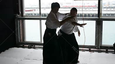 Japanese men demonstrating Aikido