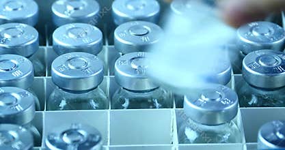 4k Add injection bottle from box.medical health hospital equipment & drug vial.