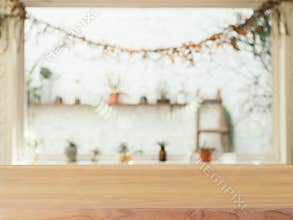 Wooden board empty table in front of blurred background. Perspective brown wood over blur in coffee shop - can be used for