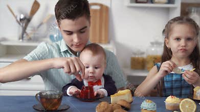 Funny children eat sweets