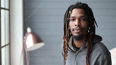 Portrait of african american hipster smiling