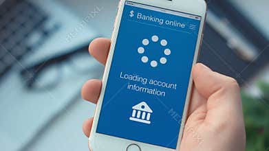 Checking bank account on banking app on the smartphone