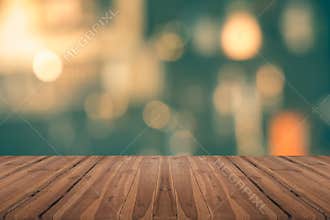 Empty wood table top on blurred background