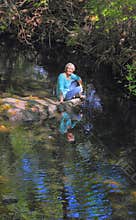 Lady by the Creek