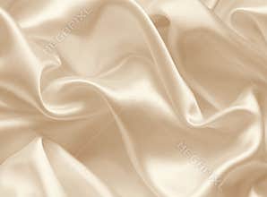 Smooth elegant golden silk as wedding background. In Sepia toned
