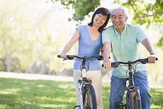Mature couple bike riding