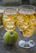 Apple cider with ice cubes