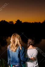 Mother and Daughter Watching the Sunset