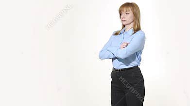 Hands crossed on his chest. barrier closed, discontent. girl in pants and blous. Isolated on white background. body