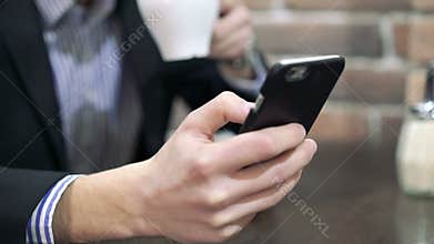 Smartphone holding in the hand, zoom