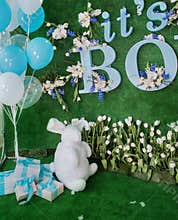 Holiday decoration with blue and white balls and flowers