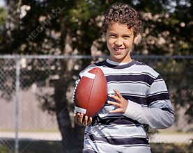 Young boy with football