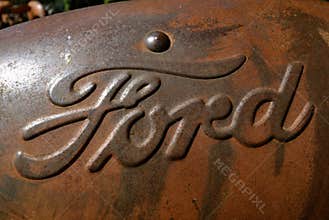 Ford Motor Company logo on an old tractor hood