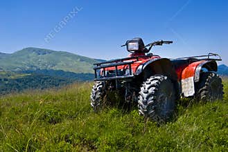 red atv on highlands- quad