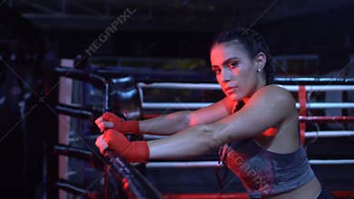 Brunette strong fitness woman at the gym