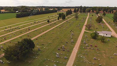 Aerial view of tranquil cemetery in a countryside.