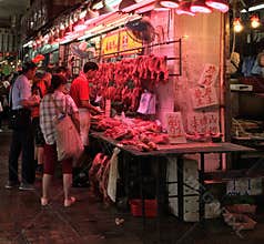 Butcher selling fresh meat