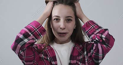 Beautiful teen girl smiling over white background