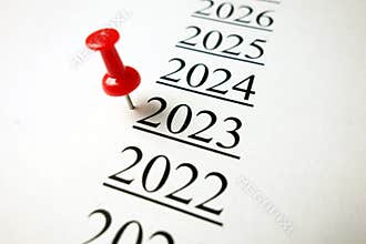 Number 2023 with red pushpin