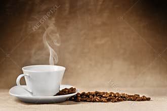 Coffee beans and coffee cup