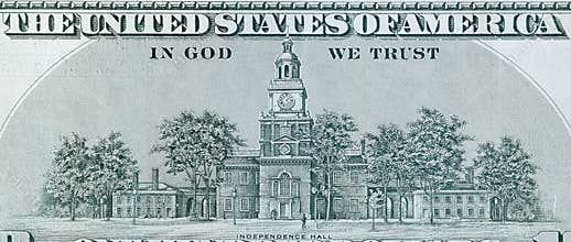 Independence Hall on 100 dollars banknote back side closeup macro fragment. United states hundred dollars money bill