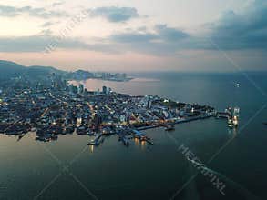 Aerial view ferry arrive Penang terminal at night.