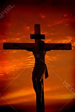 Crucifixion of Jesus Christ during sunset