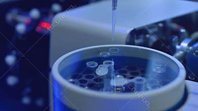 Apparatus for automatic sampling, analysis. A robo hand takes a sample from a test tube for testing or analysis. New