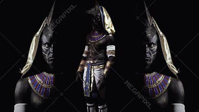Anubis appearing from the dark, mirror effect on the sides
