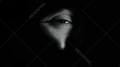 Crying woman looking through hole, kidnapping victim feeling scared, witness