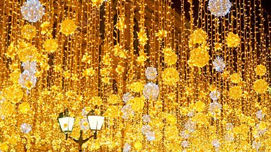 Bright Christmas Street Illumination. The City is Decorated for the Christmastide Holiday. New Year Lights Decorating