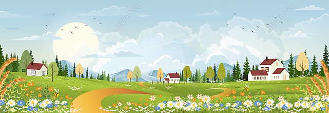 Spring landscape with peaceful rural nature in springtime with wild grass land,farm house,mountain,sun, blue sky and clouds