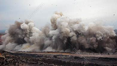 Explosion of rock in coal mining quarry