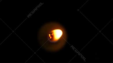 Animation top view Flame from candle on black background.
