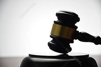 Judge hitting Gavel on white background