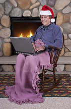 Mature Senior Woman Christmas Laptop Santa Hat