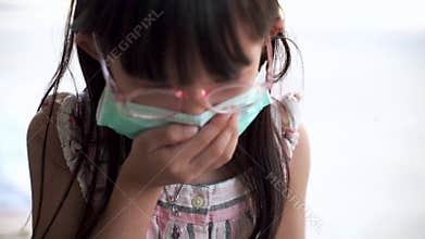 Kids wearing the mask for protect them self from and air pollution. Prevention by mask to reduce spread of the coronavirus