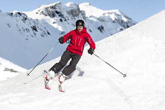 Man skiing alps