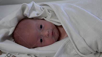 Baby vomiting close up view.  Baby Girl Vomit, after breast feeding time