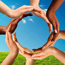 Multiracial Hands Making a Circle Together