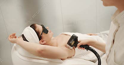 Laser epilation cosmetology. hair removal procedure, Laser epilation.