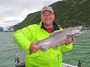 Alaska - Happy Man Holding King Salmon