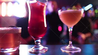 Ready-made drinks are on the bar ready to be consumed.