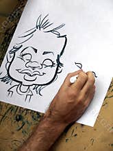 man drawing caricature