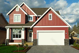 New Red House Home With White Trim